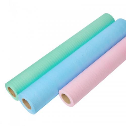 China Laminated Paper Film Roll Degradable Examination Bed Sheet Paper Film Roll Couch/Table Pad Fabricante