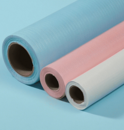 China Elderly Care & Travel Disposable Bed Sheet Roll, Multi-Color PP+PE Hygiene Roll for Nursing Home & Short-Stay Accommodation Fabricante